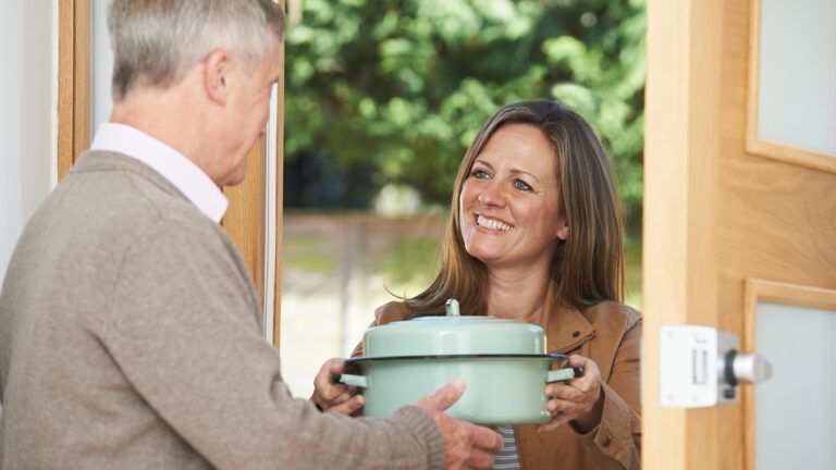 Woman visiting neighbor