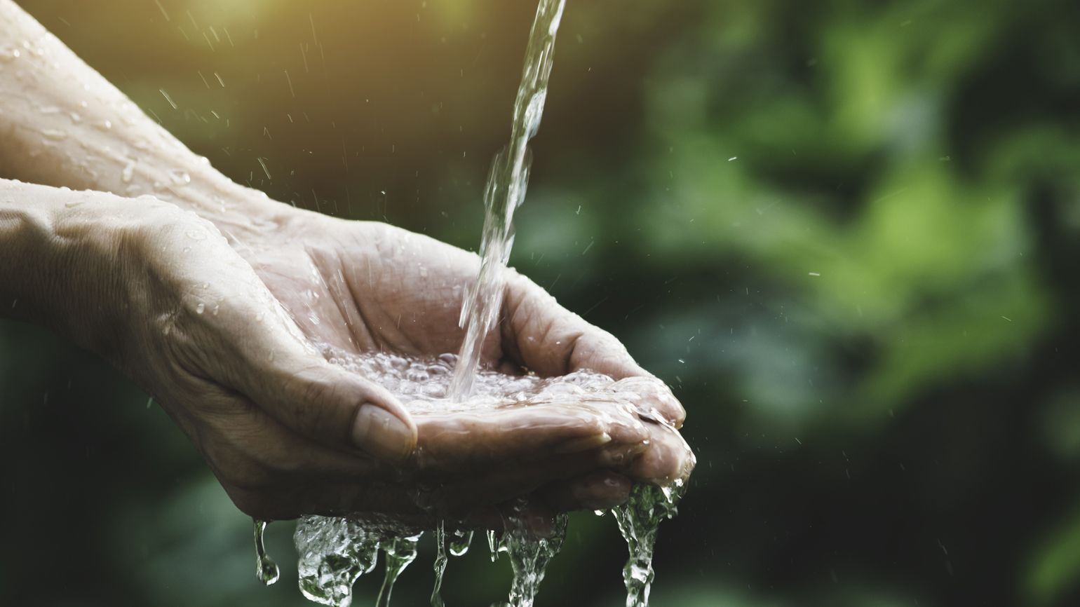 Water flow to open palms; Getty Images