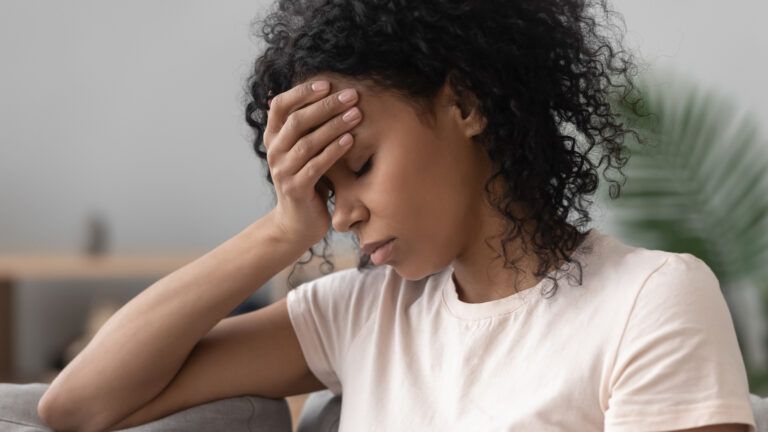 A woman dealing with stress; Getty Images