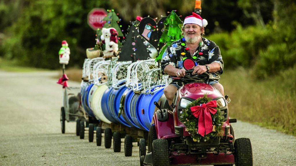 Paul driving his decorated doggie train around the neighborhood