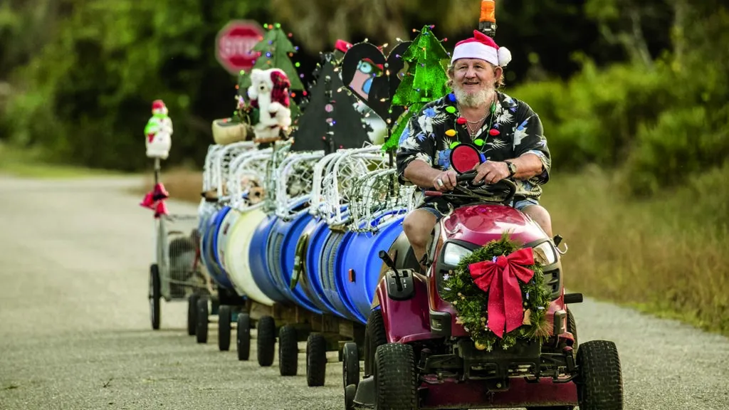 Paul driving his decorated doggie train around the neighborhood