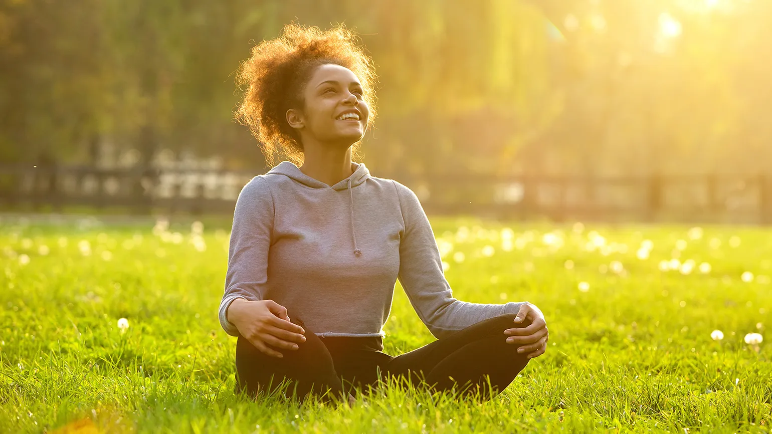 Smiling woman enjoying the outdoors