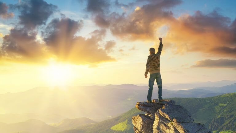 man_triumphant_mountain_climber_hiker