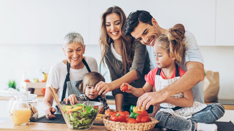 Family cooking together in the kitchen