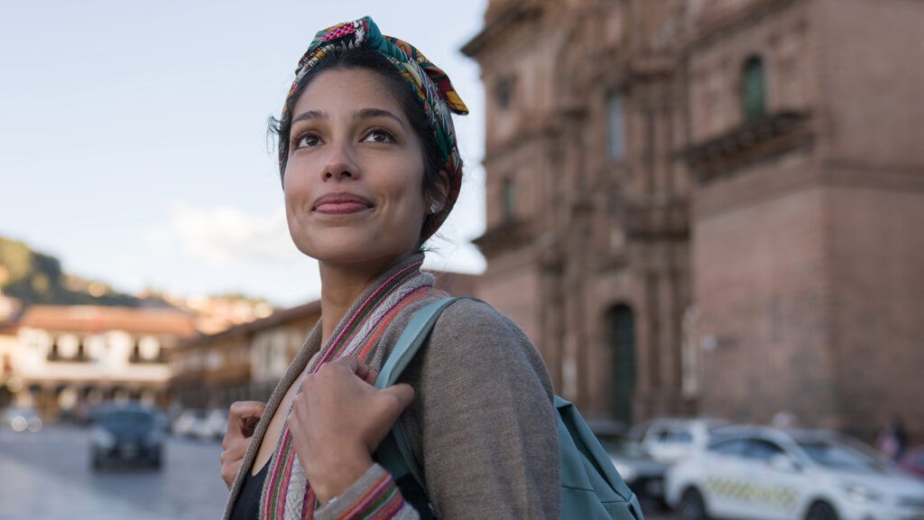 Woman smiling while sightseeing