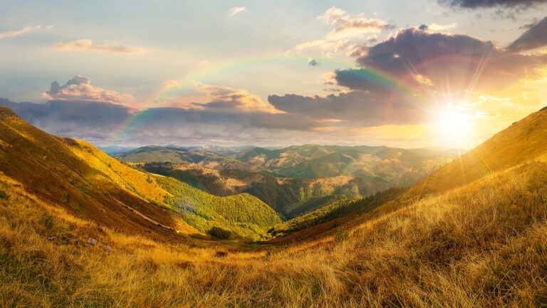 A rainbow in the mountains