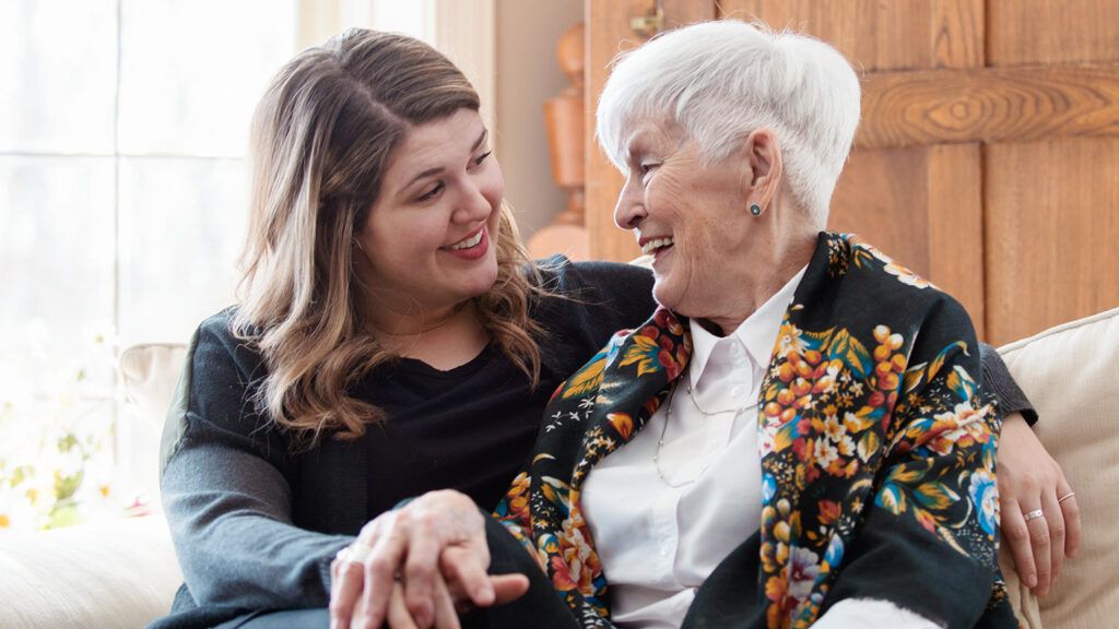 A mother and her adult daughter celebrate Mother's Day