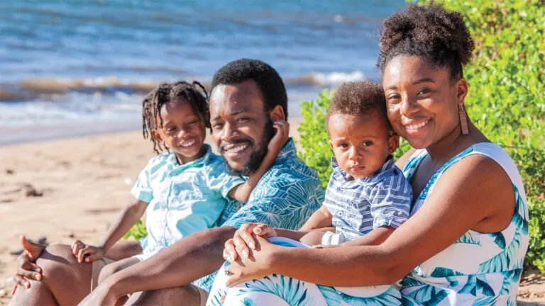 Tiera and Myron with sons Myron, left, and Micah; photo by Tony Novak-Clifford