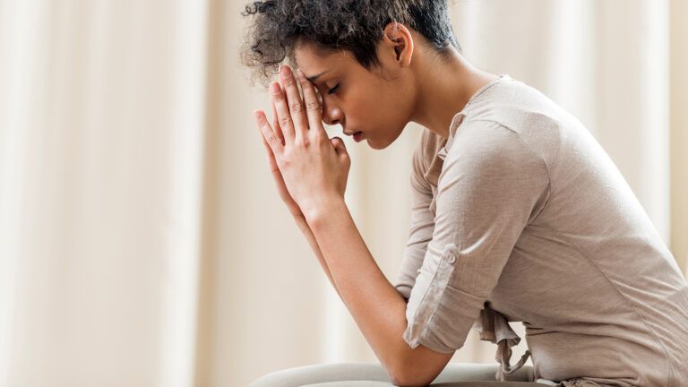 Young woman praying