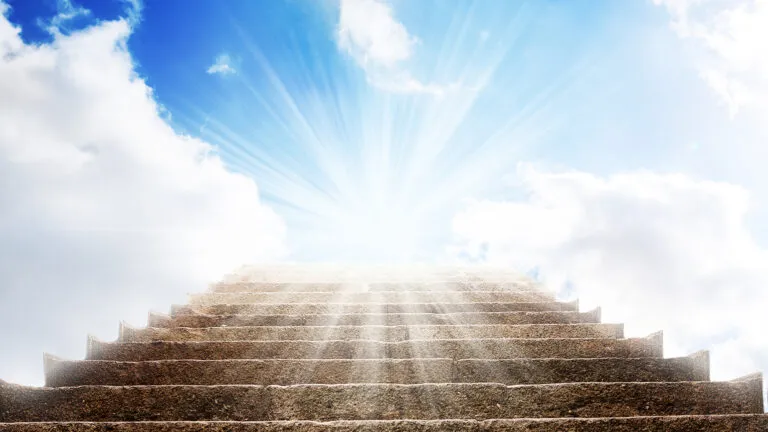 A stone stair in the way up to blue sky