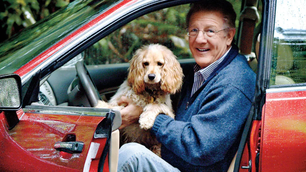 Michael and Honey in a vehicle; Photo credit: Keith Brauneis