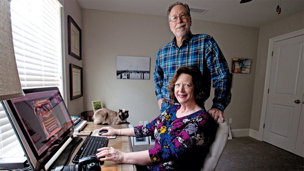 Lisa Faire Graham at home with her husband Bill and cat Mitzi; photo by Mark Wallheiser