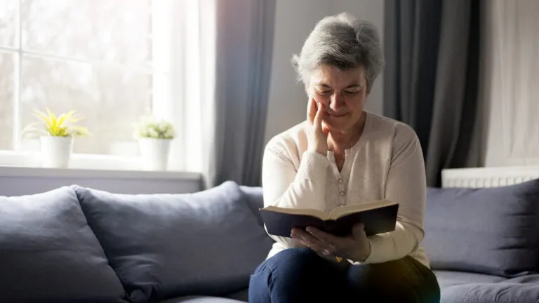 A woman reads the Bible