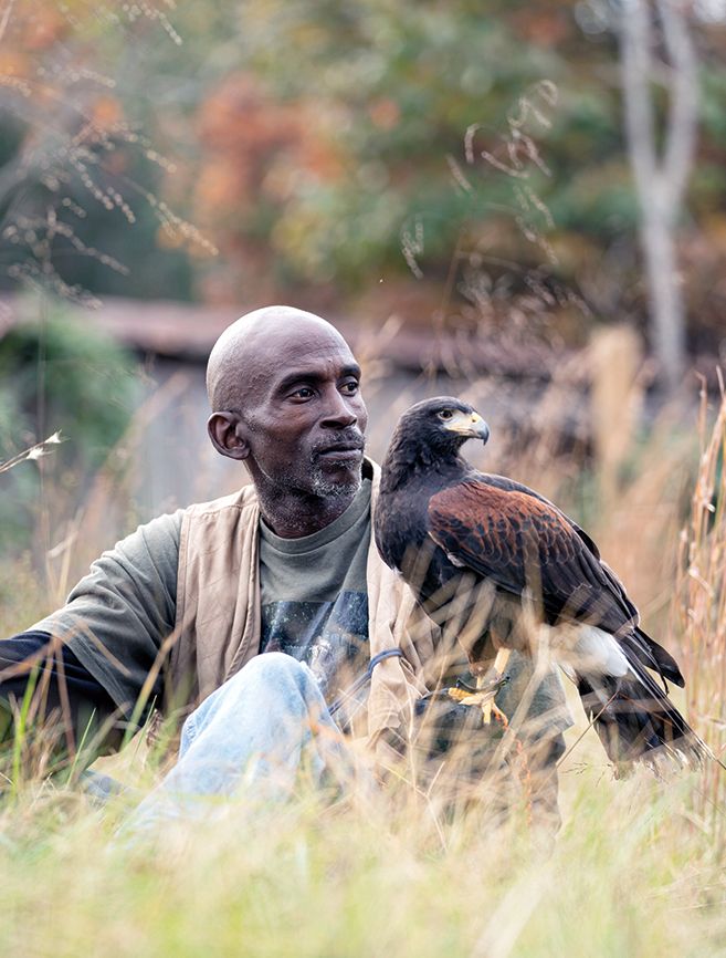 Rodney with Agnes, a Harris’s hawk; photo by James Kegley