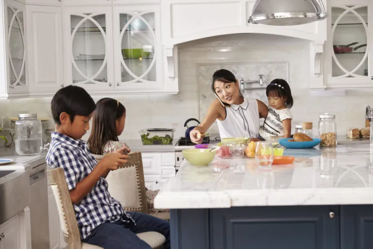 Busy mom getting breakfast for kids