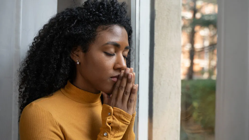 A woman prays