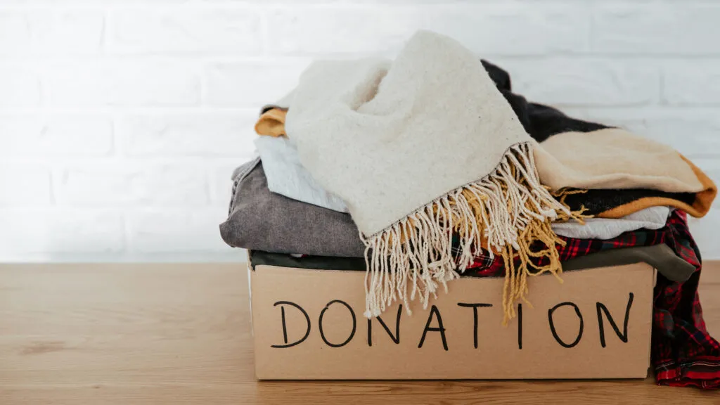 Pile clothes for donation in a decluttering project